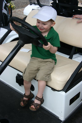 Liam driving the golf cart