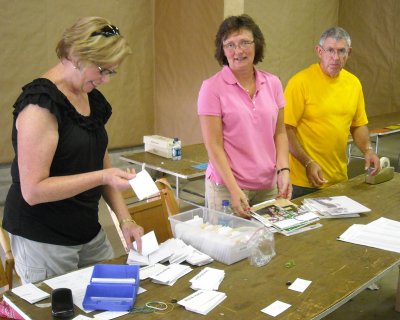 Volunteers taking in Fair Entries