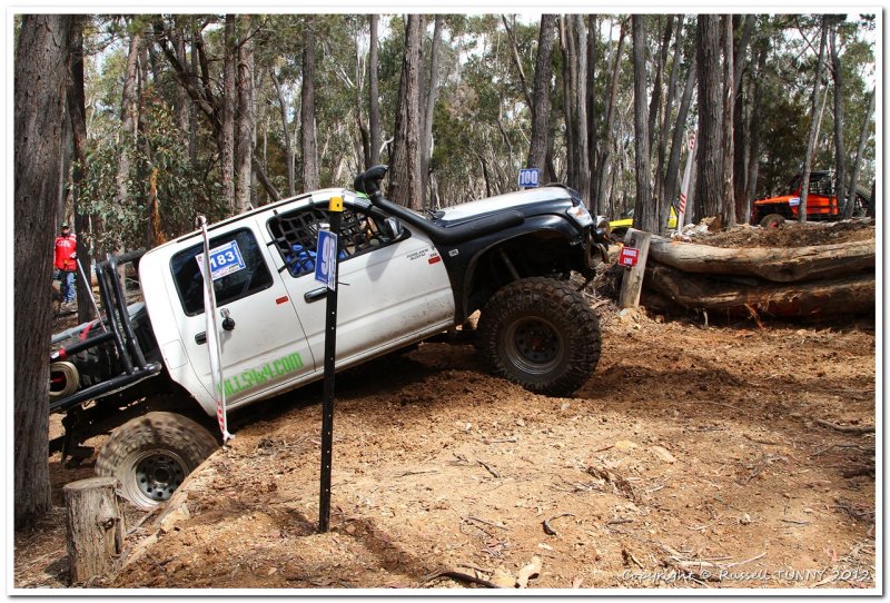 Ramming the Rear Wheels into the Log for more traction