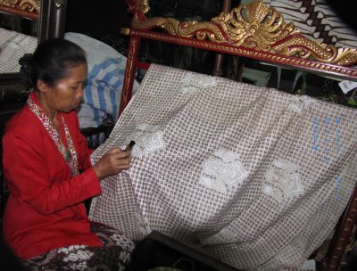 Woman Demonstrating Batik Design