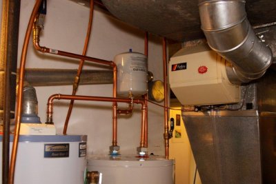 plumbing connecting water storage tank to water heater