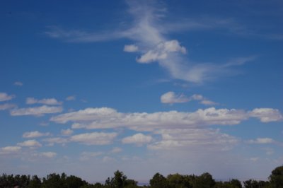 Clouds reflecting desert below