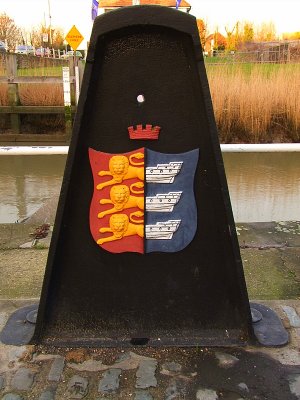 Sandwich;quay marker with town badge.