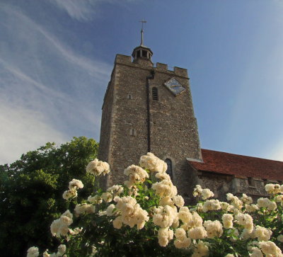 Holy  Cross  Parish  Church, with  roses, adjacent.
