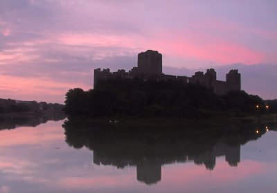The  dawn  arrives  over  Pembroke  Castle.