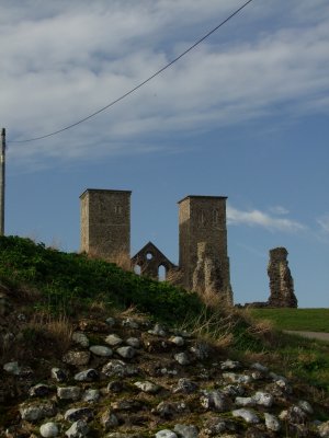 Reculver ; the church towers,with a section of Roman Walling in foreground.