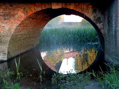 Reflections  under  a  bridge.