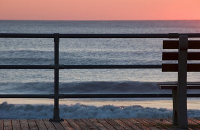 Boardwalk, Bench, and Ocean at Dawn