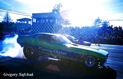 Fighting Irish FC on track start burnout pit side.jpg