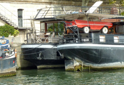 Man On Top Of Car On Top Of Boat-1030603.jpg