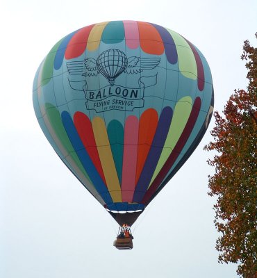 Hot Air Balloon Floats Over the House