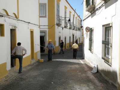 whitewashing (and watching) in the back streets of Evora