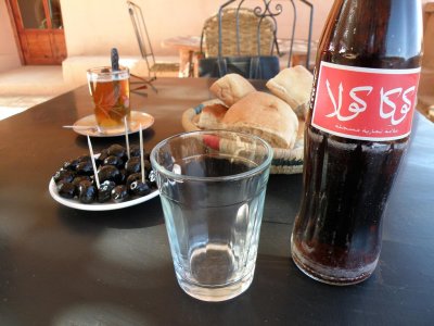a typical midday snack: mint tea, bread, olives, and a Coke
