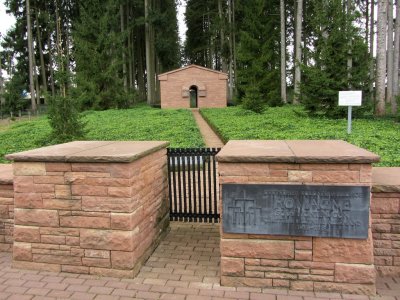 just outside the village, a well-kept German military cemetery...