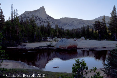 Sun about to be revealed behind Cathedral Peak