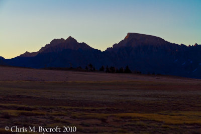 First sunlight on north faces of Mt. Russell and Mt Whitney from Bighorn Plateau