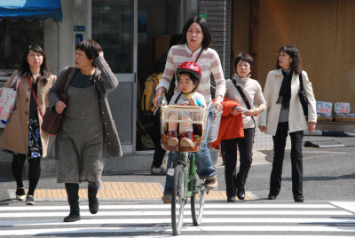 Cyclist and girl, Akihabara, Tokyo