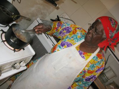 Maude cooking for guests