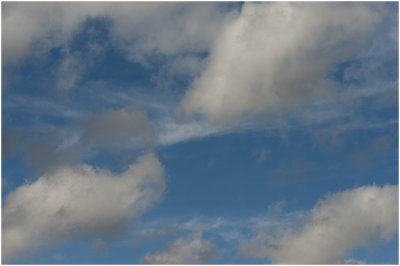 stapelwolken boven de Maas