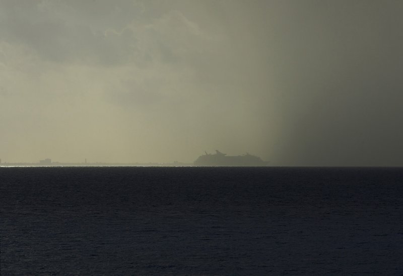 Cruise ship heading into storm.jpg
