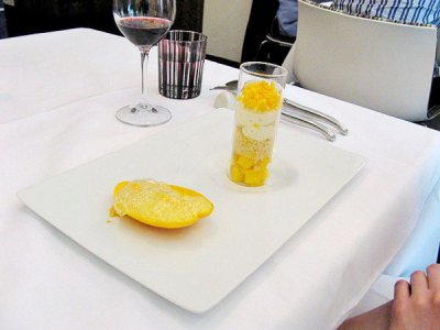 Mango with warm Meyer lemon cake, frozen mango power and mango bubbles