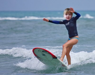 Emily surfs.jpg