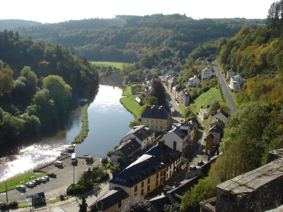 The river wraps around the town, the other side