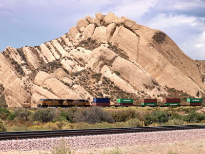 UP stack train passing mighty Mormon Rocks near Cajon Pass, CA