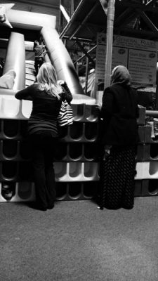 Portland has a population of Muslim people, so we see women in muslim garb...