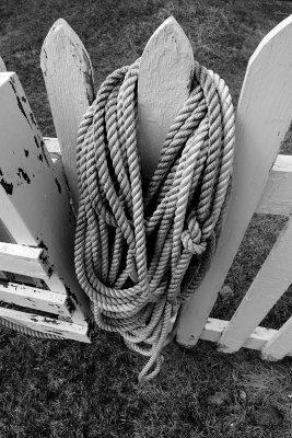 The safety rope is draped over the fence