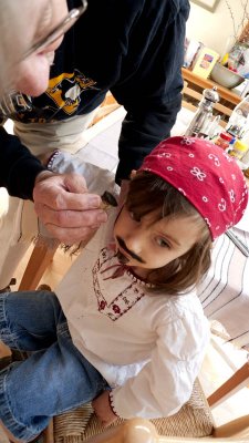 June 13: It's Pirate Day in Damariscotta, so our little pirate gets painted to go.