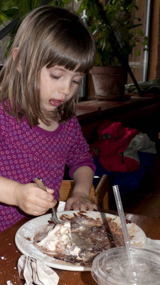It's a hot fudge brownie for dessert and she eats it almost all by herself!
