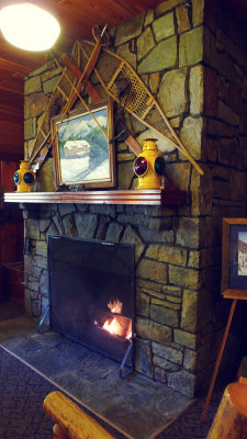 And the fireplace is decorated wtih snow gear.
