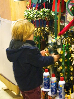 More holiday fun...this kid was ringing bells in a store. He looks a bit like the other boy without the hat!