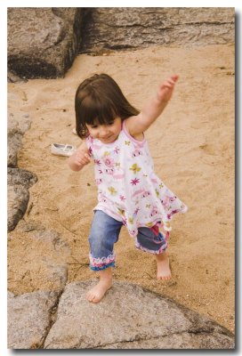 ....Lorelei enjoys the feel of sand on bare feet...