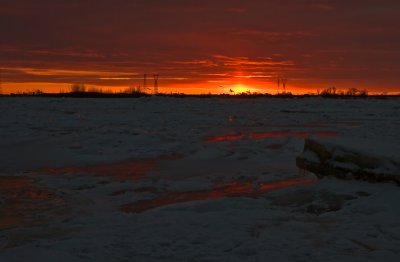 Coucher de soleil sur le fleuve glac