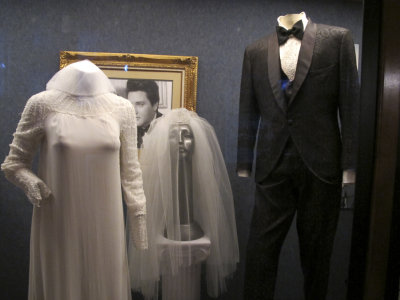 Priscila's wedding gown and Elvis' tux