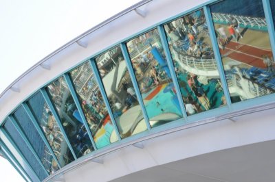 Reflections of the pool and top deck