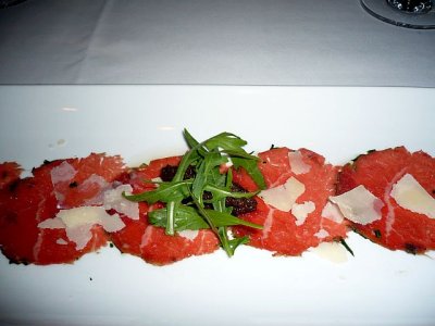 wagyu carpaccio, olive tapenade, truffled parmesan and peppergrass