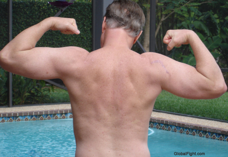 dad flexing pool backyard.jpg