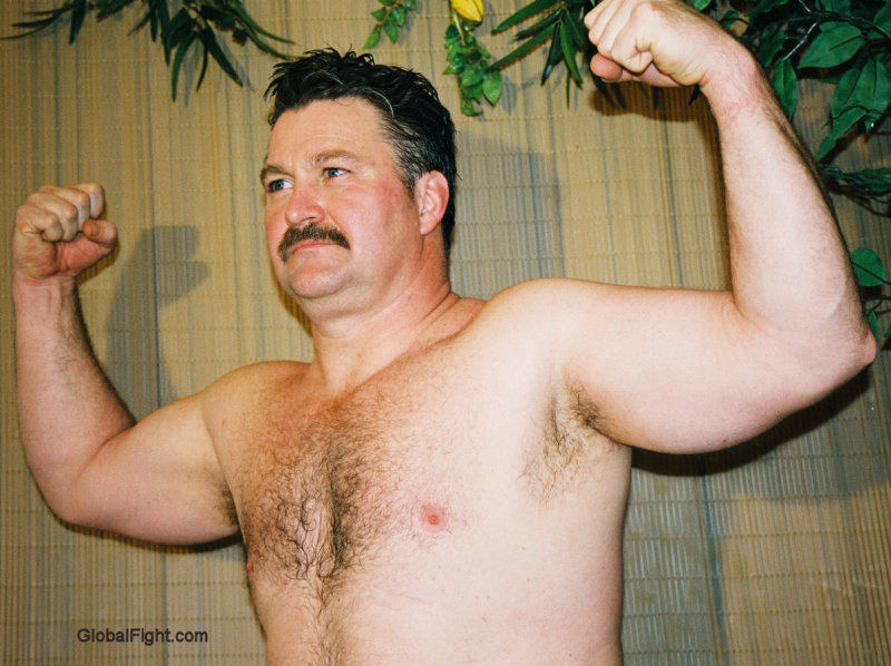 super hot musclebear flexing big arms.jpg