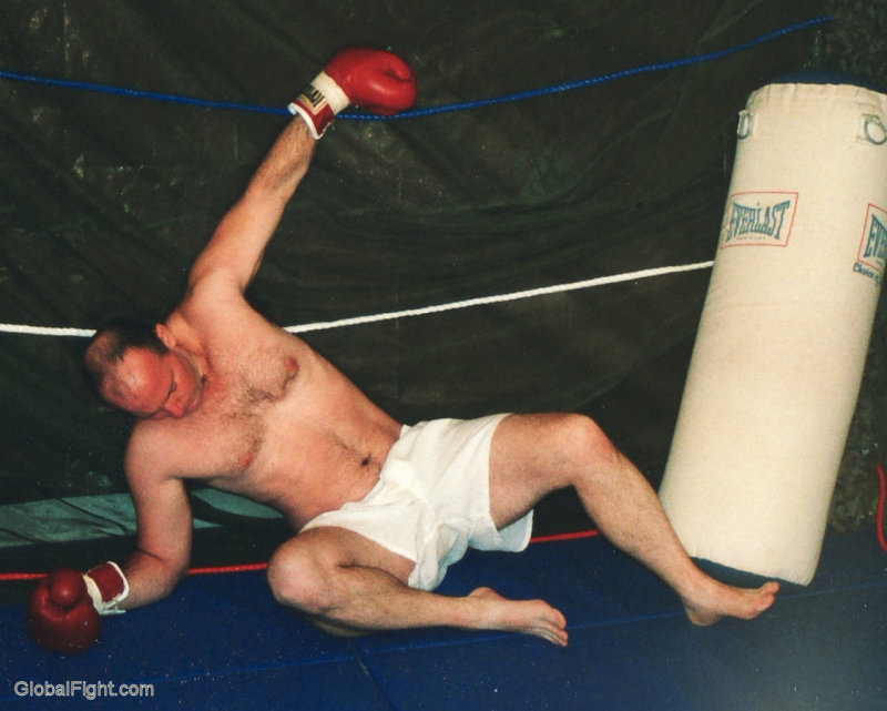 boxer knocked down to mats.JPG