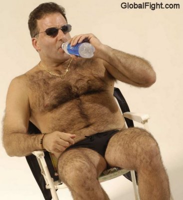 dad hot cooling off beach.jpeg