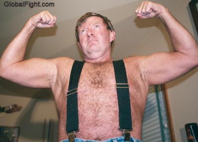 muscle flexing leather bear.jpeg