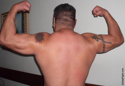 big deltoids tattoos hard muscles.jpg