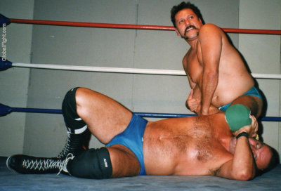 moustache wrestler fighting hunky man.jpg