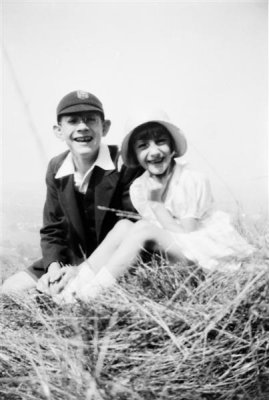 Dad and Margaret in grass_negMscan (Medium).jpg