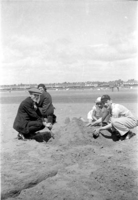 Grandad May Dad and Margaret on beach_negMscan (Medium).jpg