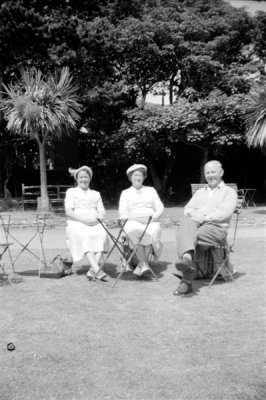 Holiday Grandma and couple on chairs in a park_negMscan (Medium).jpg