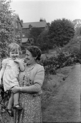 Lorna in garden at Oriel Lodge 04 with Grandma Wilson_negMscan (Medium).jpg
